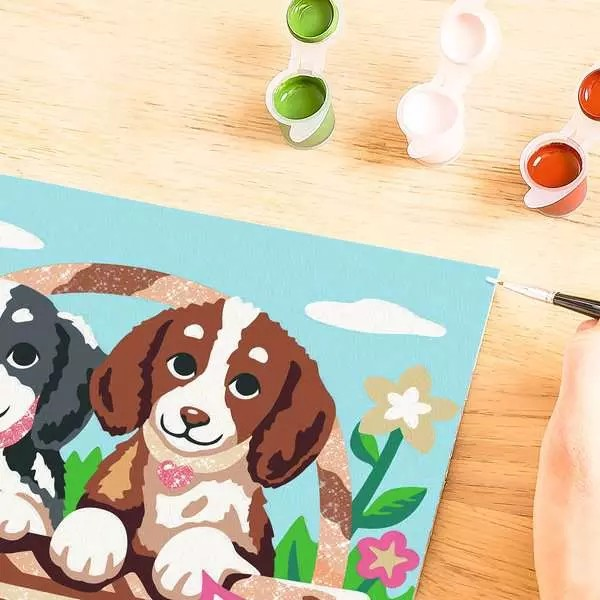 Hunde im Körbchen