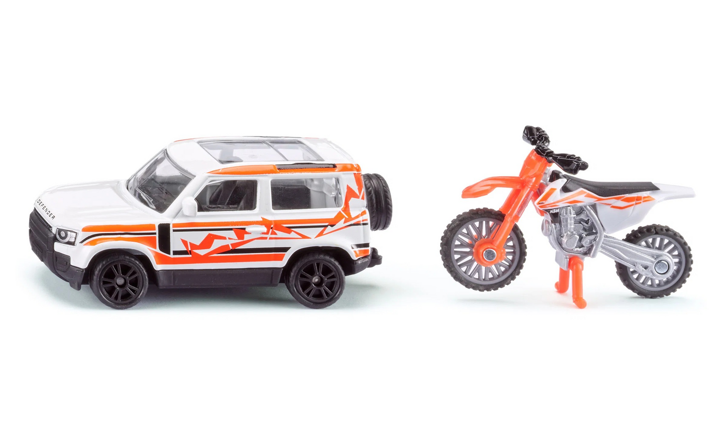 Land Rover Defender mit KTM Motorrad