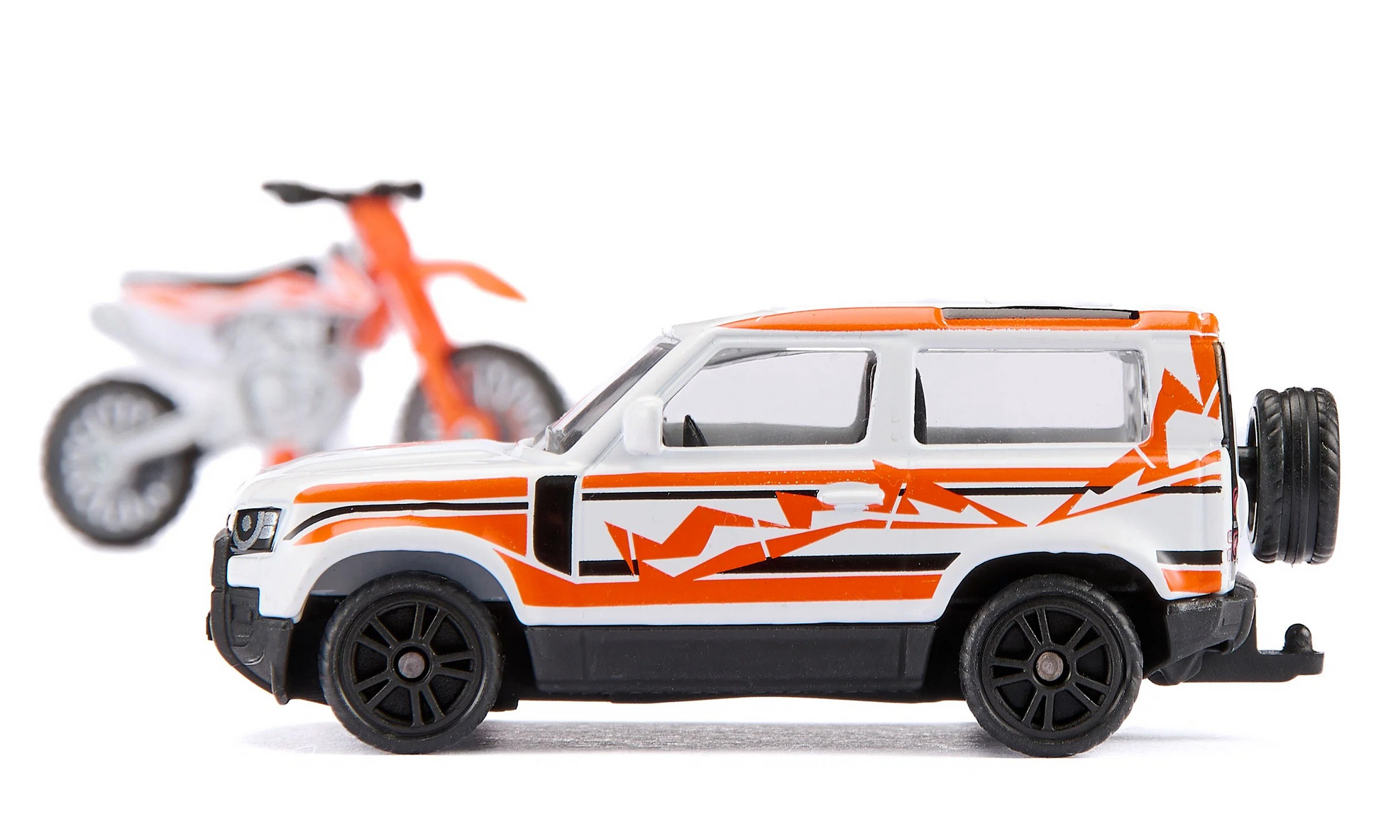 Land Rover Defender mit KTM Motorrad