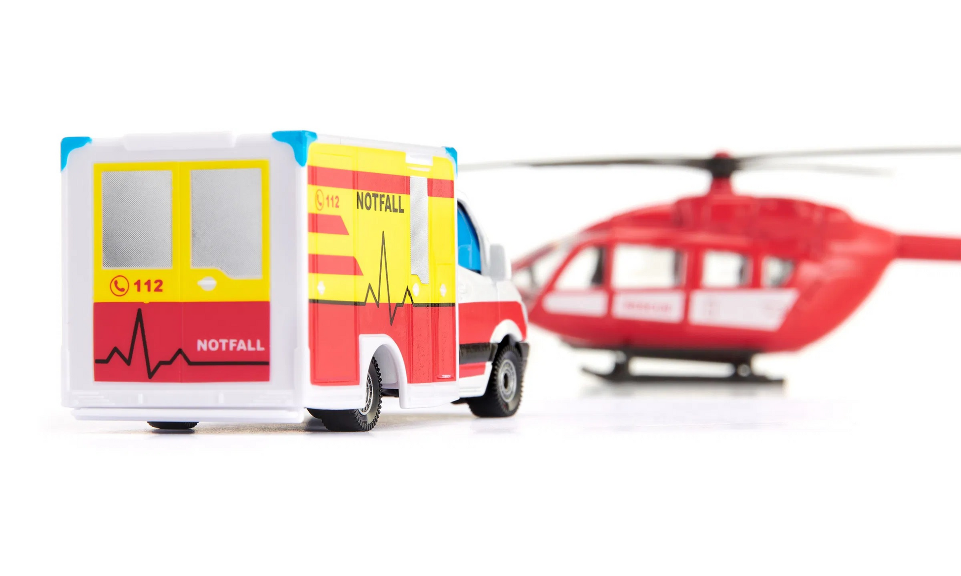 Mercedes-Benz Rettungswagen und Hubschrauber